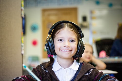 child with headphones